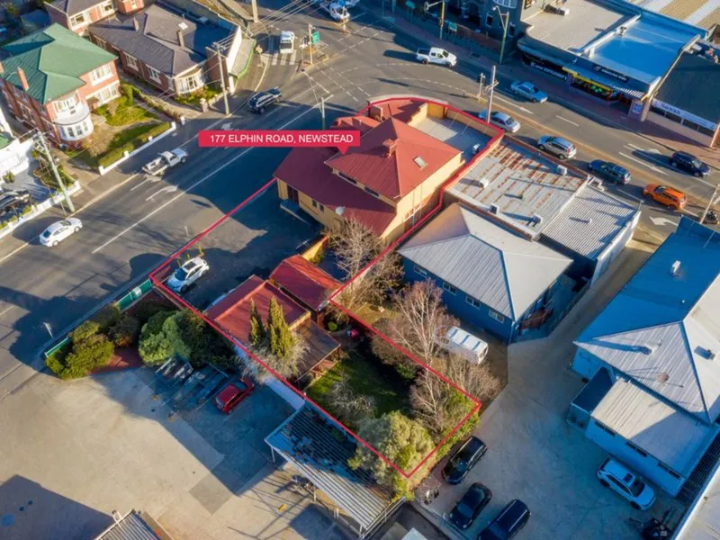 Premier Suburban Retail and On-site Residence