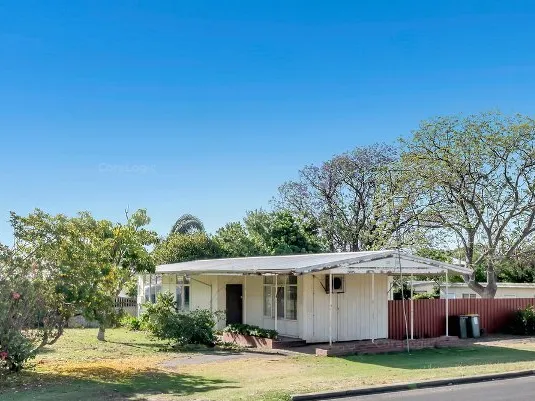 Older style 3 x 1 home on large block