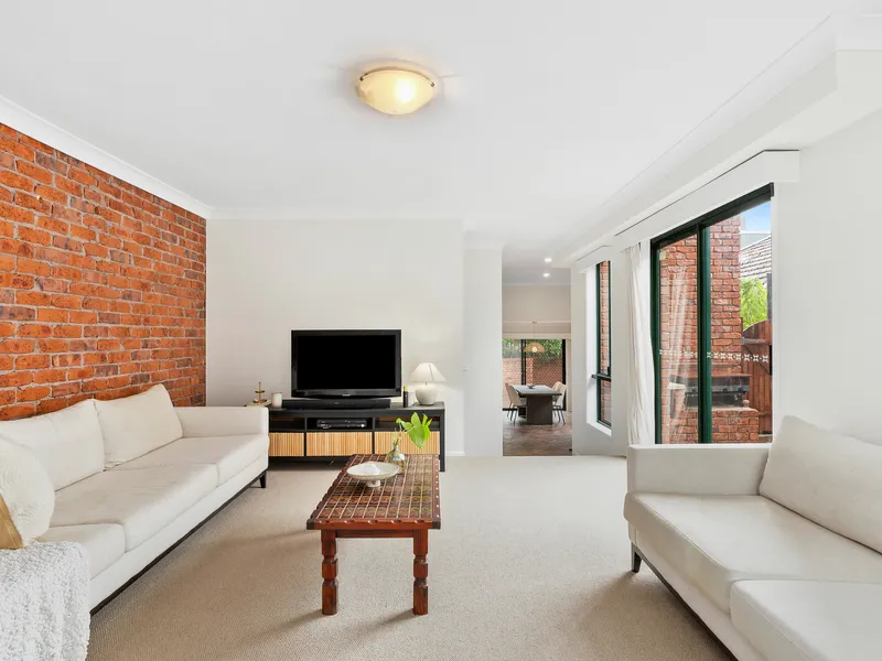 Experience the epitome of lifestyle convenience in this high-quality, two- level duplex