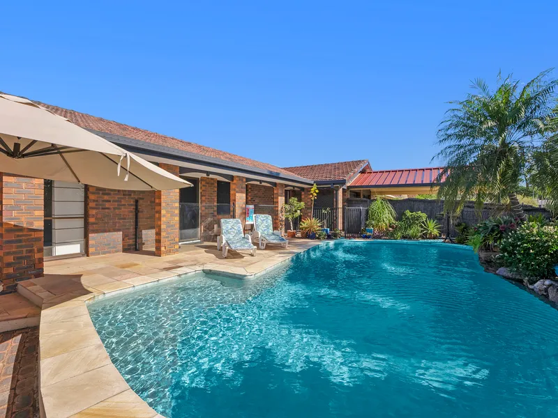 Parkside Tropical Oasis with Family Friendly Cul-de-sac Living!