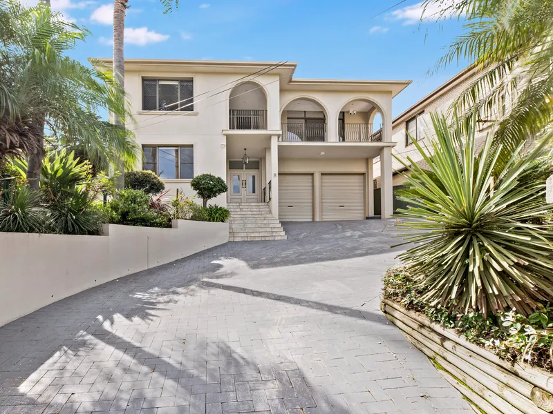 A Regal Family Abode Overlooking Bankstown's City