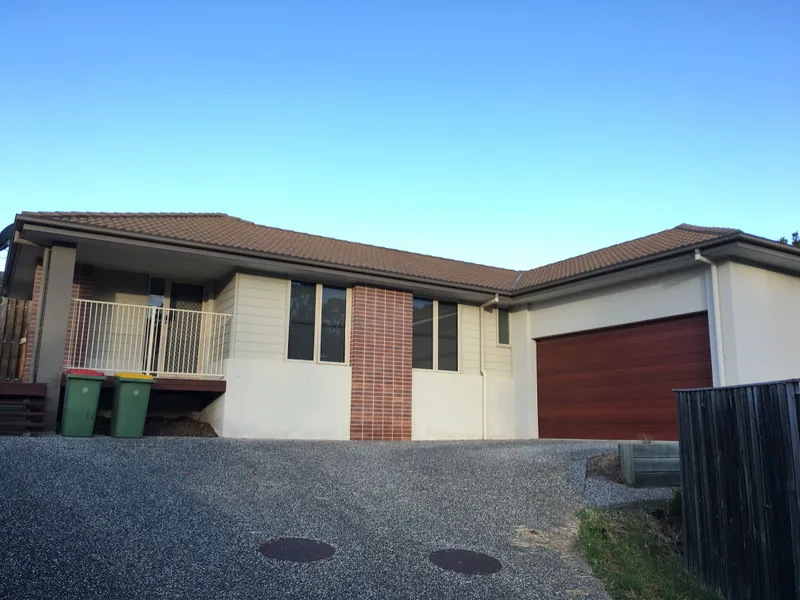 Modern Lowset Four Bedroom Home in a Great Location