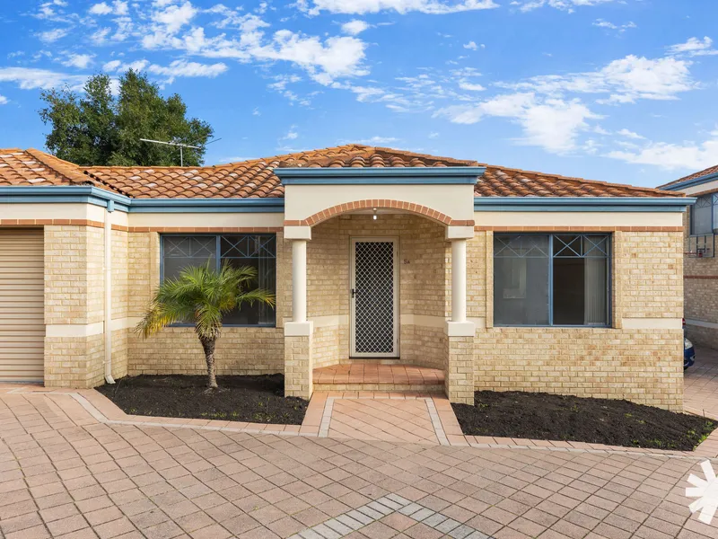 EASY-CARE LIVING WITH EXTRA PARKING