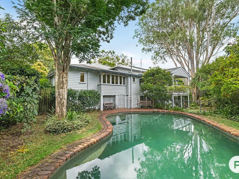 Magnificent five-bedroom Queenslander in tranquil leafy setting