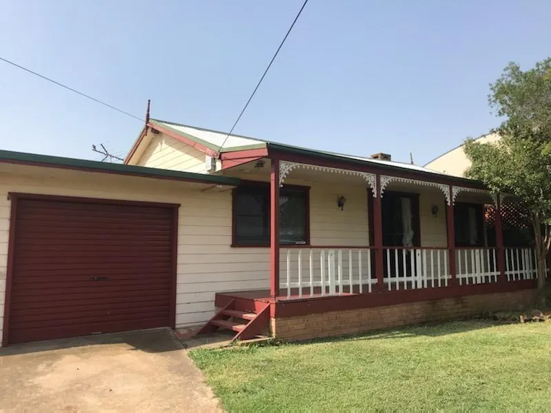 Great  family home with plenty of room for the tradie and the pets