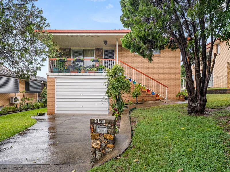 ELEVATED BRICK HOME ON 607SQM NEXT TO TOOHEY FOREST