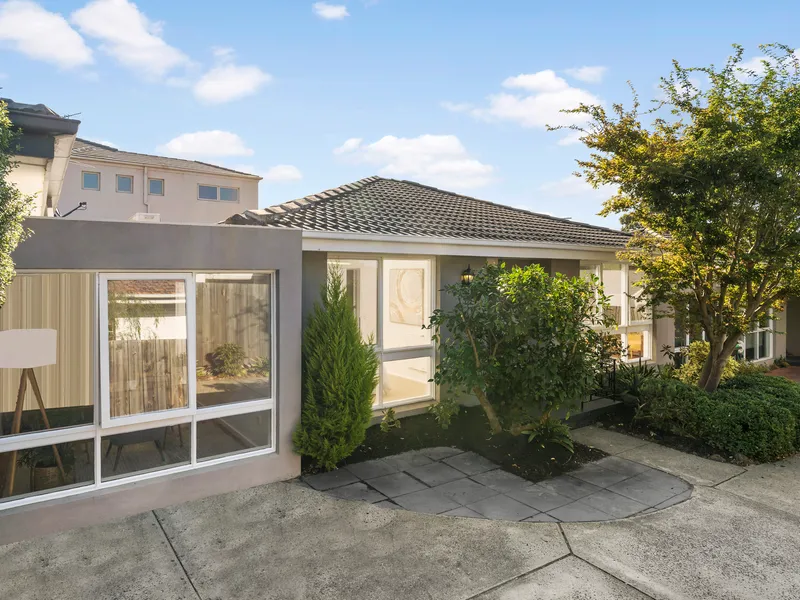 Secluded Single-Level Living in Prized Beachside Pocket