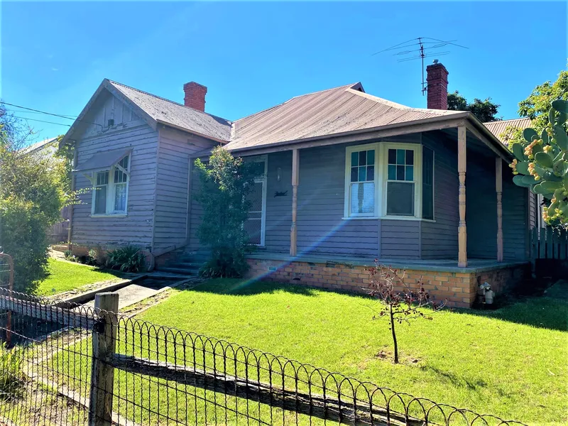 Period Charm in Prized Location!