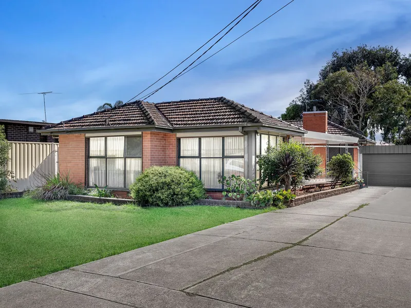 Comfortable family home with land offering endless potential.