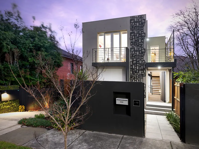 Stunning triple storey town residence in a prized riverside pocket