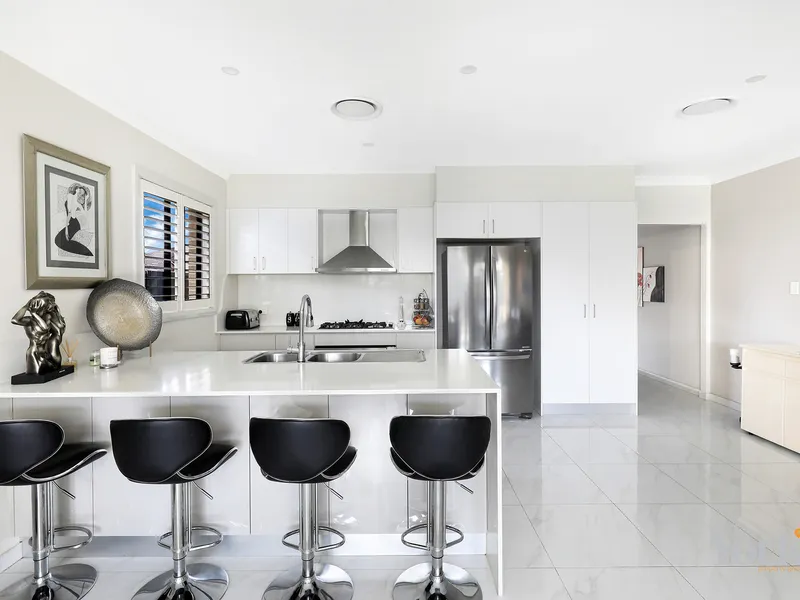 Step into this modern and vibrant three bedroom home!