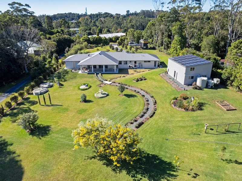 Stunning Modern home with Large shed on 7640m2 of Immaculate landscaped gardens.