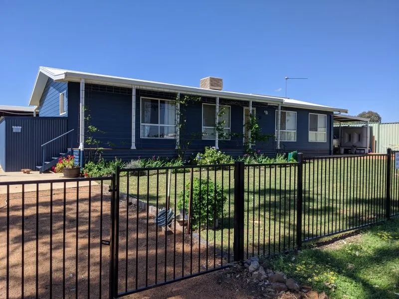 Neat Family Home in Sought-After Village Location