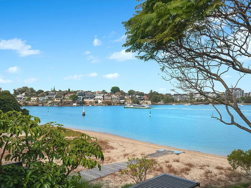 Enticing riverfront residence in a premier suburb