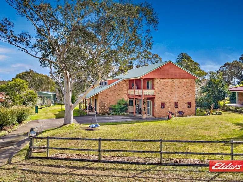 Spacious family home on a lush one acre parcel!