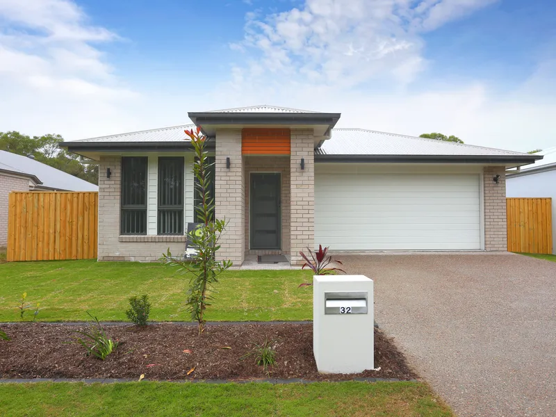 Walk to the Beach from this Stunning 4-Bedroom Home - With TWO LIVING SPACES and Bushland Views this is a Must See ! Register Now to Inspect.