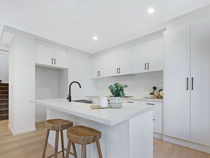 This stylish four bedroom townhouse is a stylish low-maintenance sanctuary.