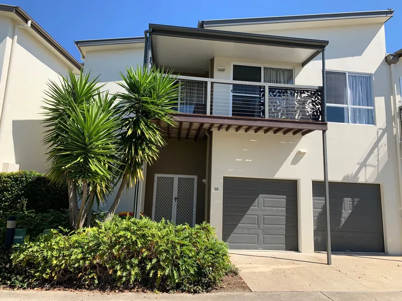 Perched high, this beautiful townhouse has it all.
