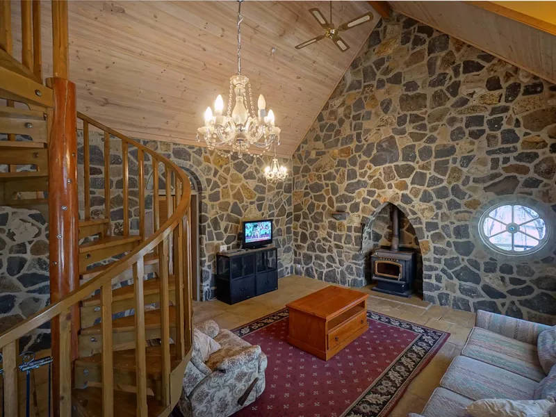 OFF GRID!! 45 tonnes of bluestone rock five and a half tonnes of cement hand crafted into a 4 bed 2 bath on 40 acres! 