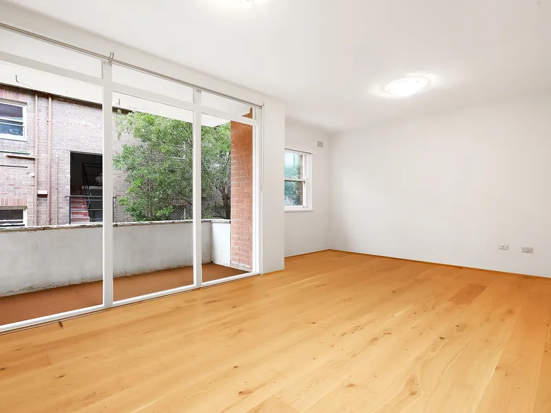 FRESHLY PAINTED TWO BEDROOM UNIT WITH NEW FLOORBOARDS