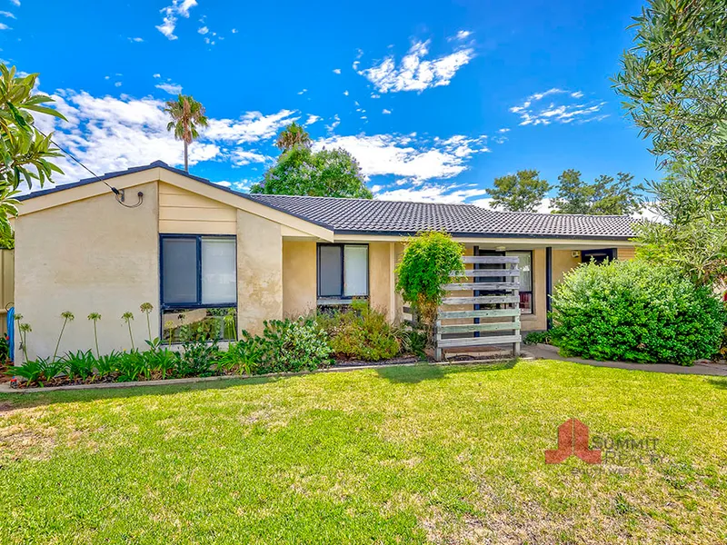 NEAT & TIDY ON A SPACIOUS BLOCK!