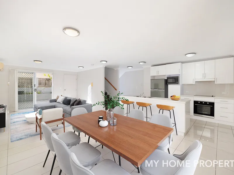 Modern tri level townhouse in demand location, close to city