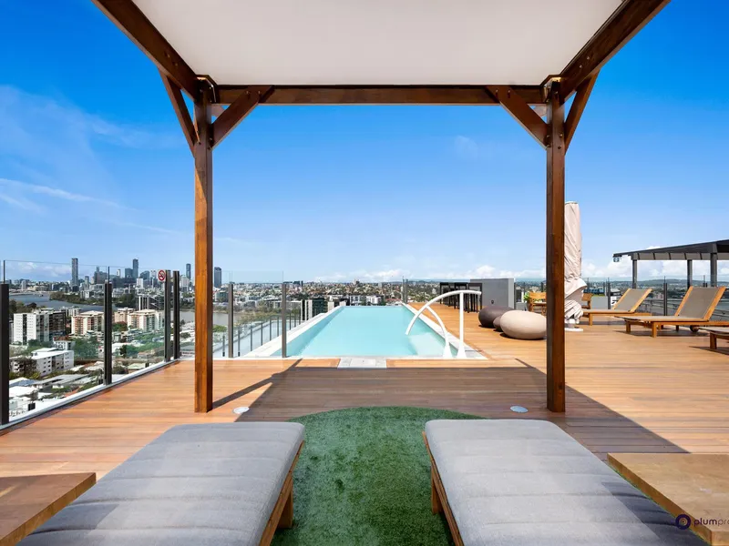 Modern, 2 bedroom unit in fantastic location with infinity pool!