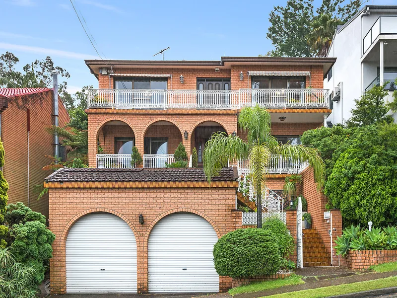 Grand full brick home with sweeping district vistas