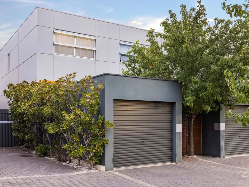 Chic Townhouse in trendy, secure and enviable location!