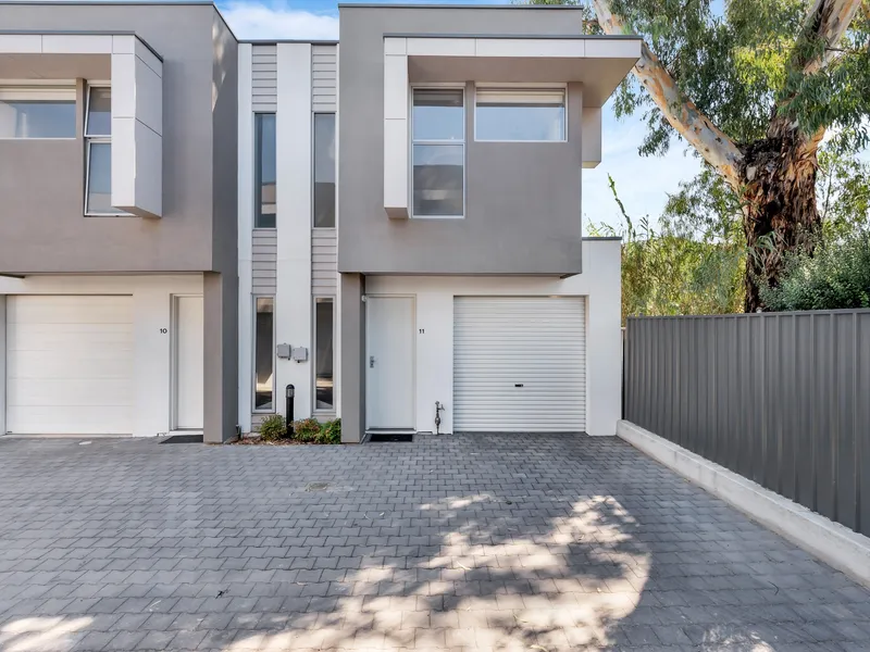 Ease, lifestyle, & The Mews: your townhome ticket that packs a patio sunset…