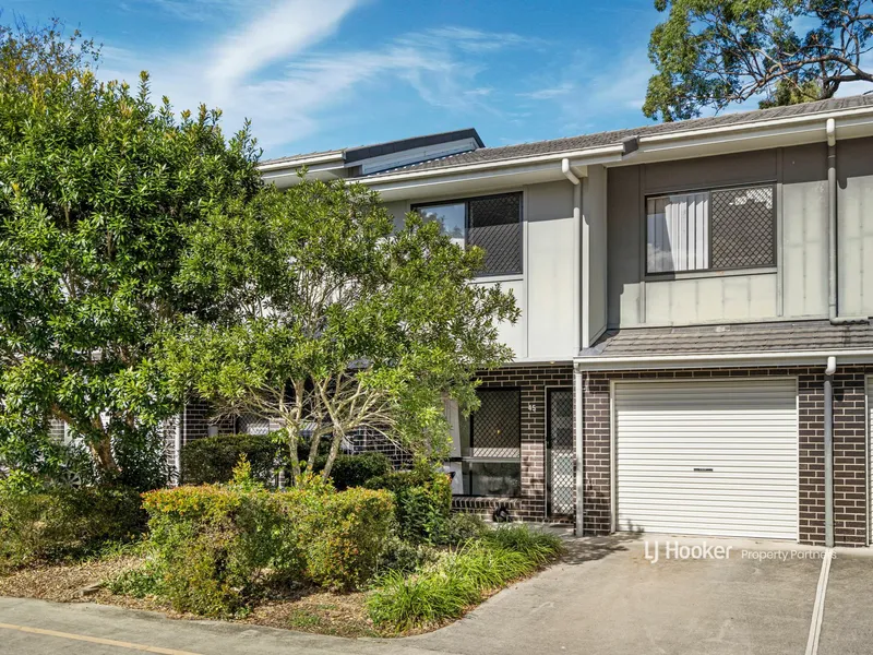 Get summer-ready in this ace townhouse with pool access