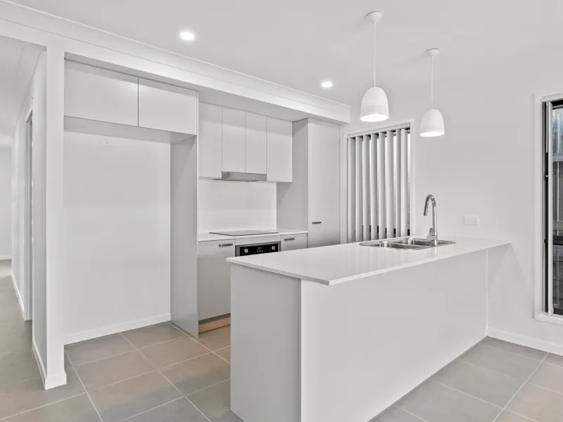 NEAR NEW, SPACIOUS AND LOW MAINTENANCE 4 BEDROOM FAMILY HOME WITH AIR CON!