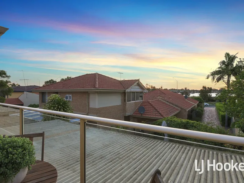 RENOVATED, SPLIT LEVEL TOWNHOUSE WITH STUNNING RIVER VIEWS