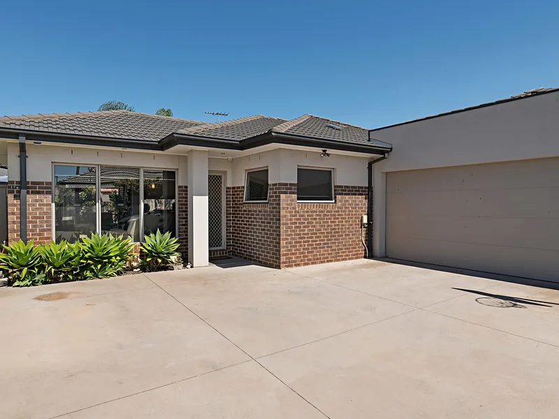 A Modern Oasis of Luxury and Location!
