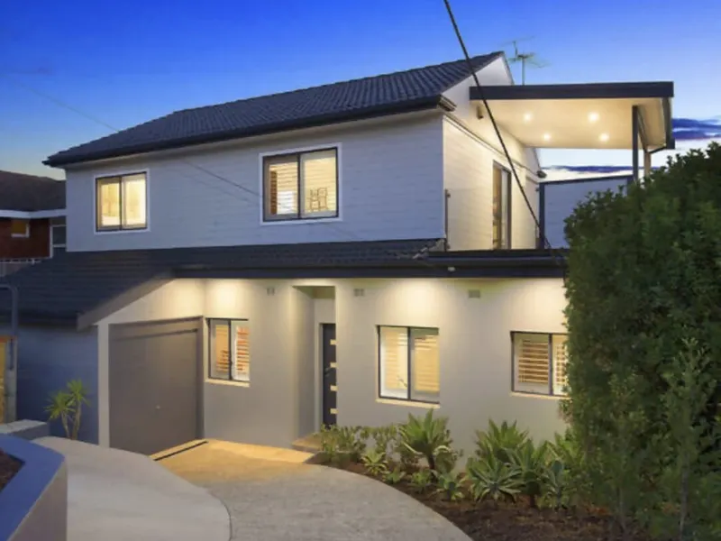 Dual family living in a premier beachside setting