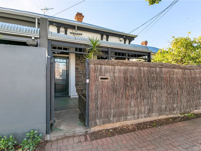 Traditional Blue Single Frontage Cottage Full of Old World Charm.