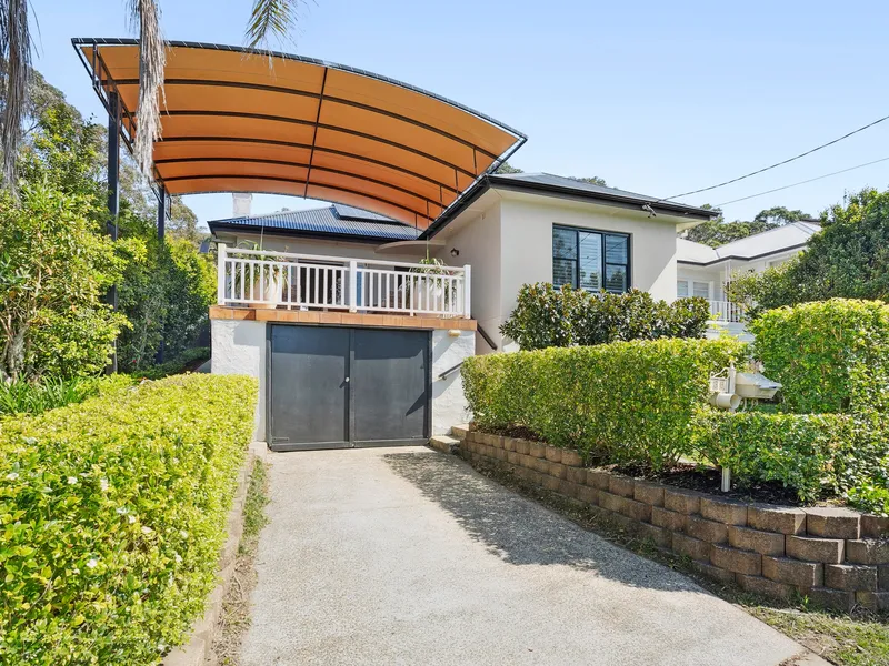 Versatile family residence with granny flat, studio & ocean views