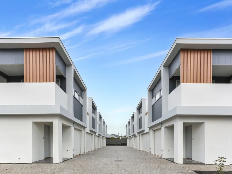 These well located and well-appointed townhouses with double garages.
