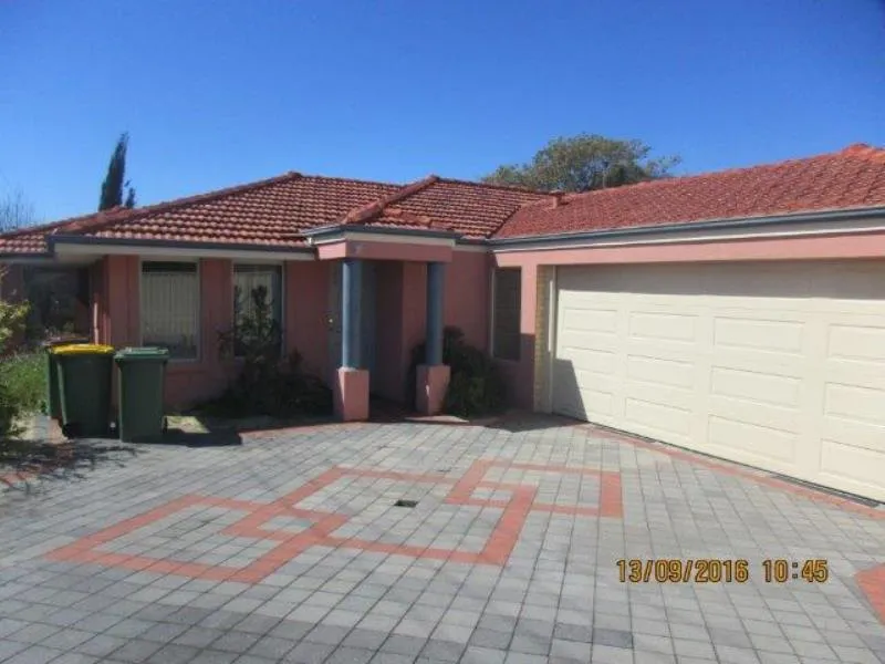 TUCKED AWAY AT THE END OF THE DRIVEWAY