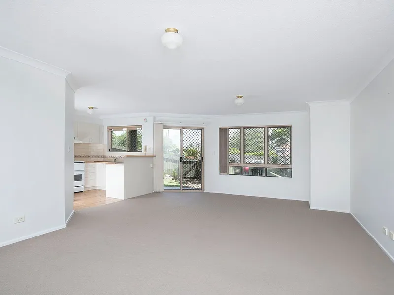 Ground floor unit with large fenced courtyard