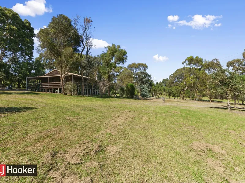 Live the quiet life on 1.5 acres