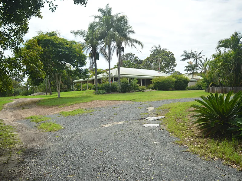 COLONIAL STYLE HOME NESTLED ON 5 ACRES!