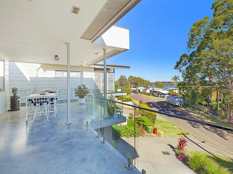 HIGH END LIVING, METICULOUSLY FINISHED, LOW MAINTENANCE WITH LAKE VIEWS