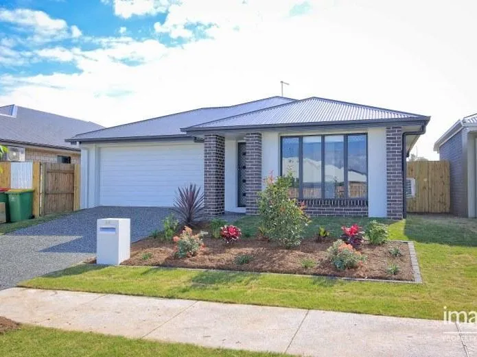 4 BEDROOM HOME WITH FAMILY SIZED BACKYARD!