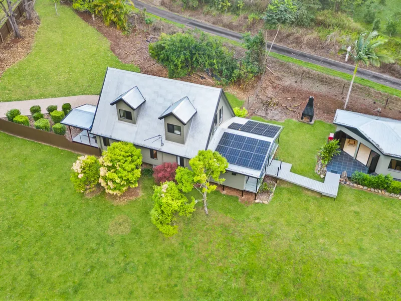 Charming Tropical Chalet with Seasonal Creek on 1.2 Acres