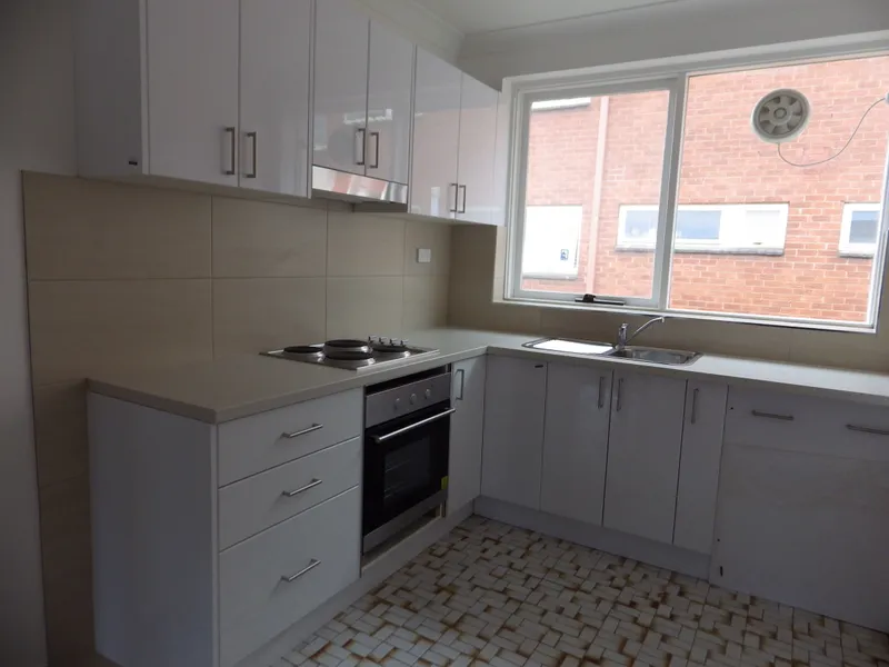 RENOVATED APARTMENT WITH AN ABUNDANCE OF NATURAL LIGHT!