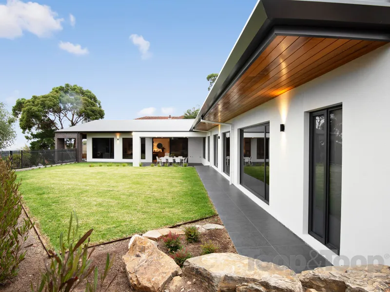 Brand new architecturally- designed executive residence with sublime city to ocean views
