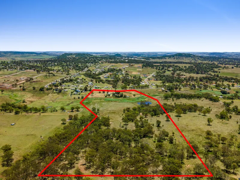 A Rare 41 Acres with Spring Fed Creek, Dam, Sheds, and a Lovely Low Set Family Home