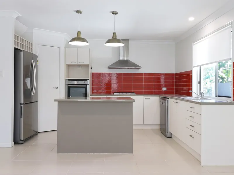 FAMILY HOME IN THE HEART OF PELICAN WATERS