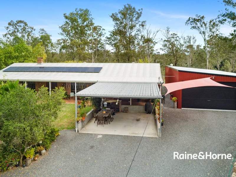 PRICE REDUCED - ACT QUICKLY!   11 ACRES OF SPACE FOR THE WHOLE FAMILY.
